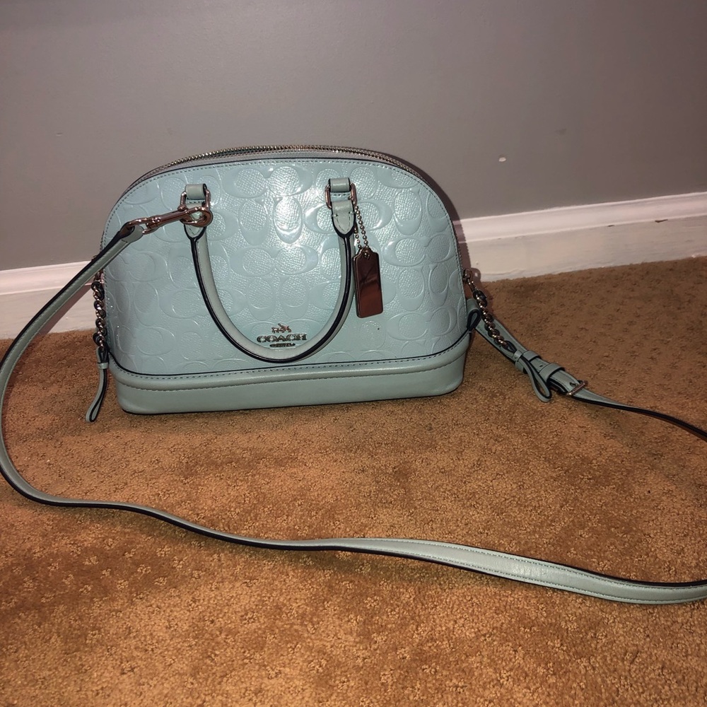 Baby blue coach crossbody with matching wallet